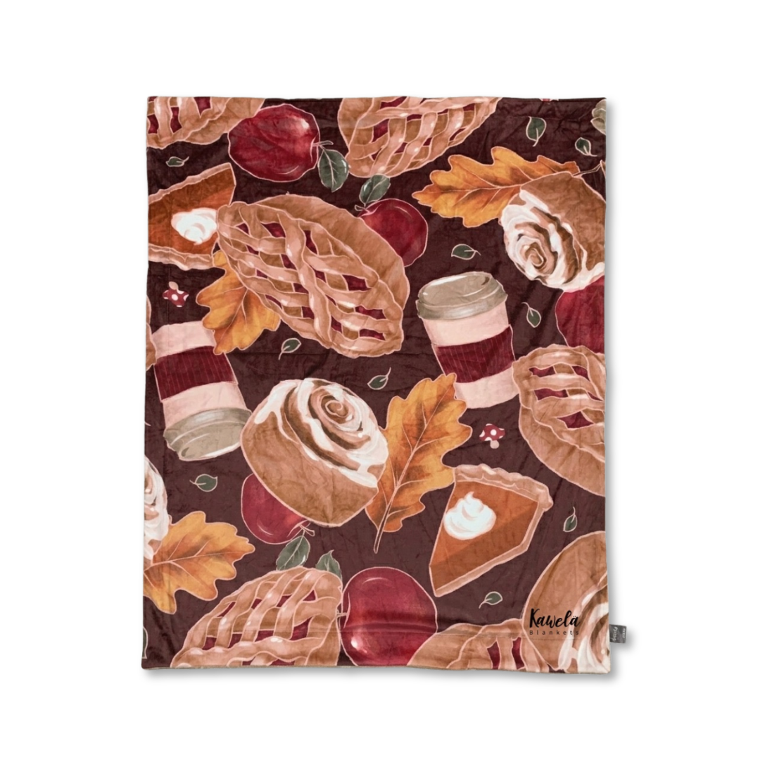Couverture XL Kawelä CIDER HILL en laine douce avec motifs élégants, idéale pour rester au chaud et ajouter du style à votre intérieur.