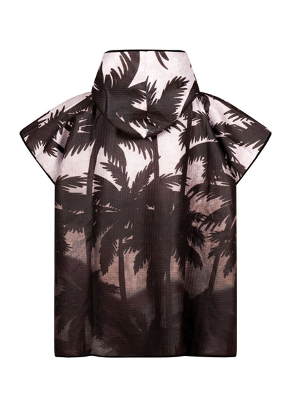 Poncho enfant KAWELÄ Andros Town avec motif coloré et capuche, idéal pour la pluie et les activités extérieures.