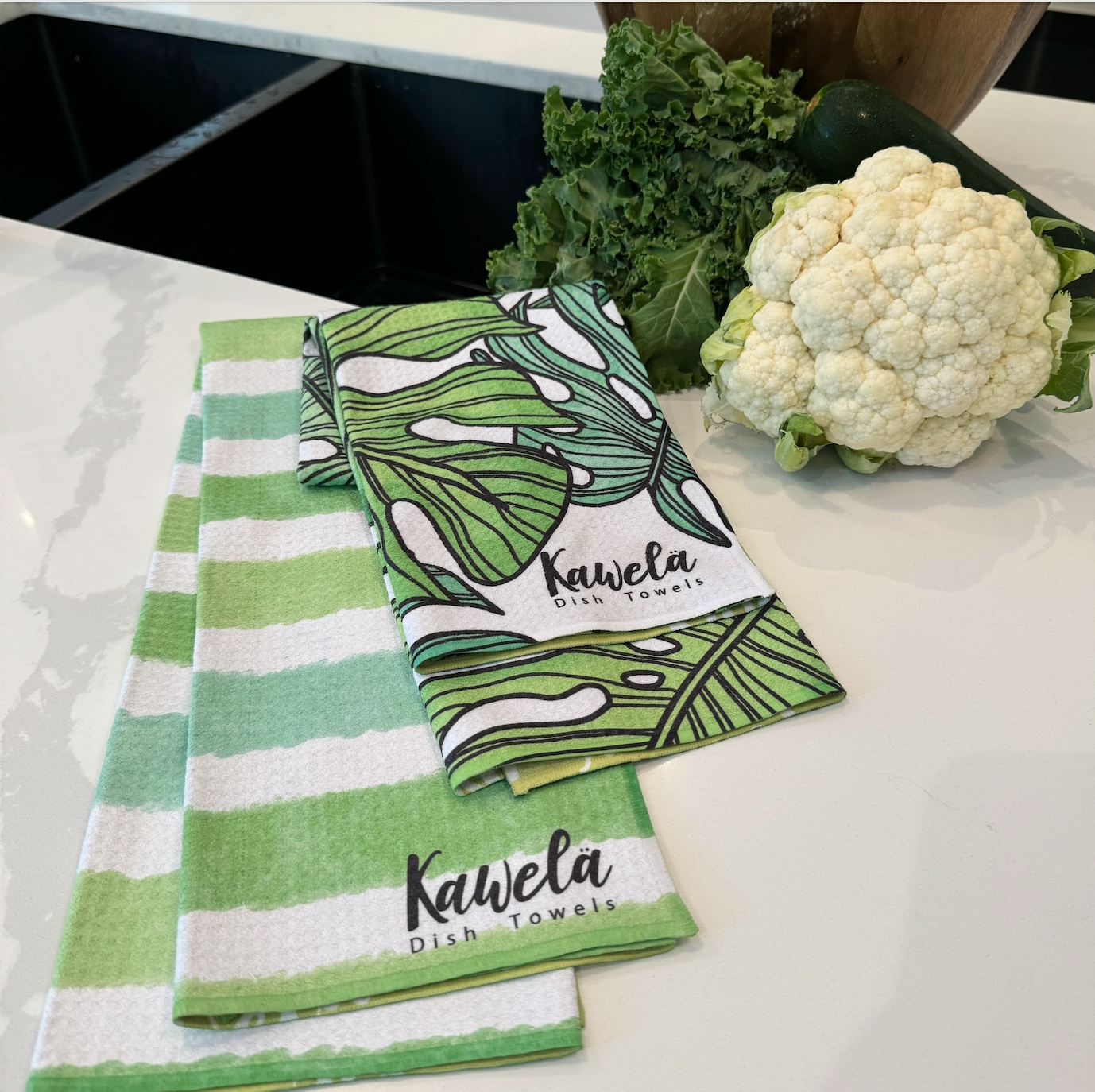 Linges à vaisselle KAWELÄ Sacramento avec motifs colorés, tissu absorbant et résistant, idéal pour la cuisine.