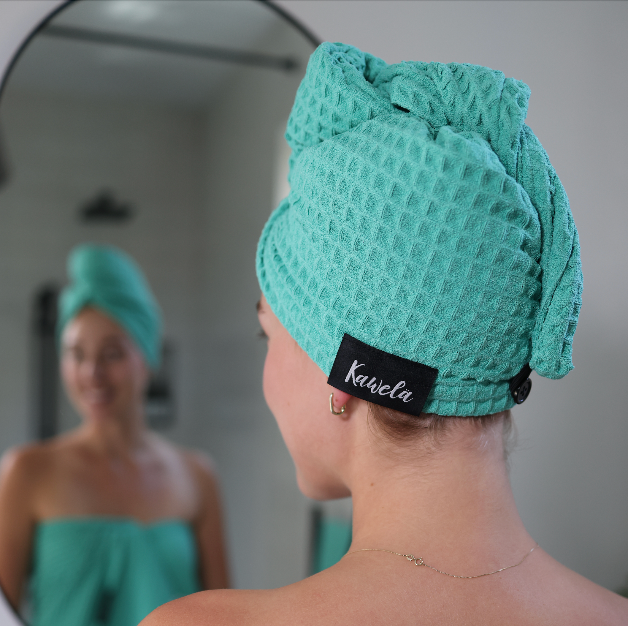 Serviette de bain KAWELÄ Turks and Caïcos avec motif coloré et douceur, idéale pour la plage ou la salle de bain.