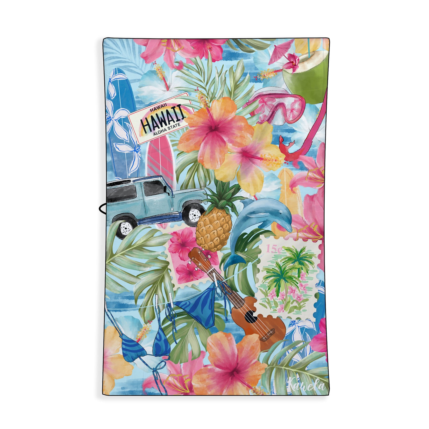 Serviette de plage Waikiki de la marque Kawela, colorée et douce, étendue sur le sable avec des motifs tropicals.