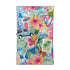 Serviette de plage Waikiki de la marque Kawela, colorée et douce, étendue sur le sable avec des motifs tropicals.