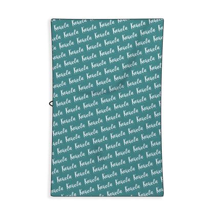 Serviette de plage KAWELÄ Le Diamant vue de dos avec motif élégant, idéale pour l&