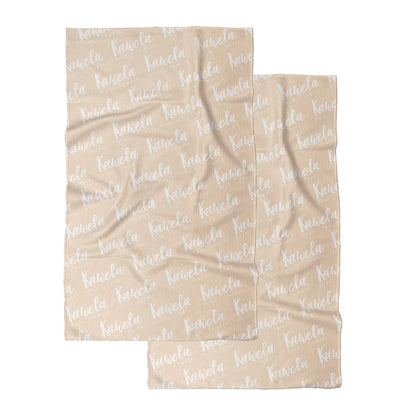 Linge à vaisselle KAWELÄ MANHATTAN avec motif de Noël, vue de dos, tissu absorbant et pratique pour la cuisine festive.