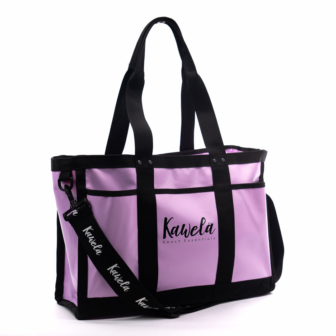 Sac fourre-tout KAWELÄ SHINAN 25L en toile, avec poignet robuste et compartiments spacieux pour un usage quotidien.
