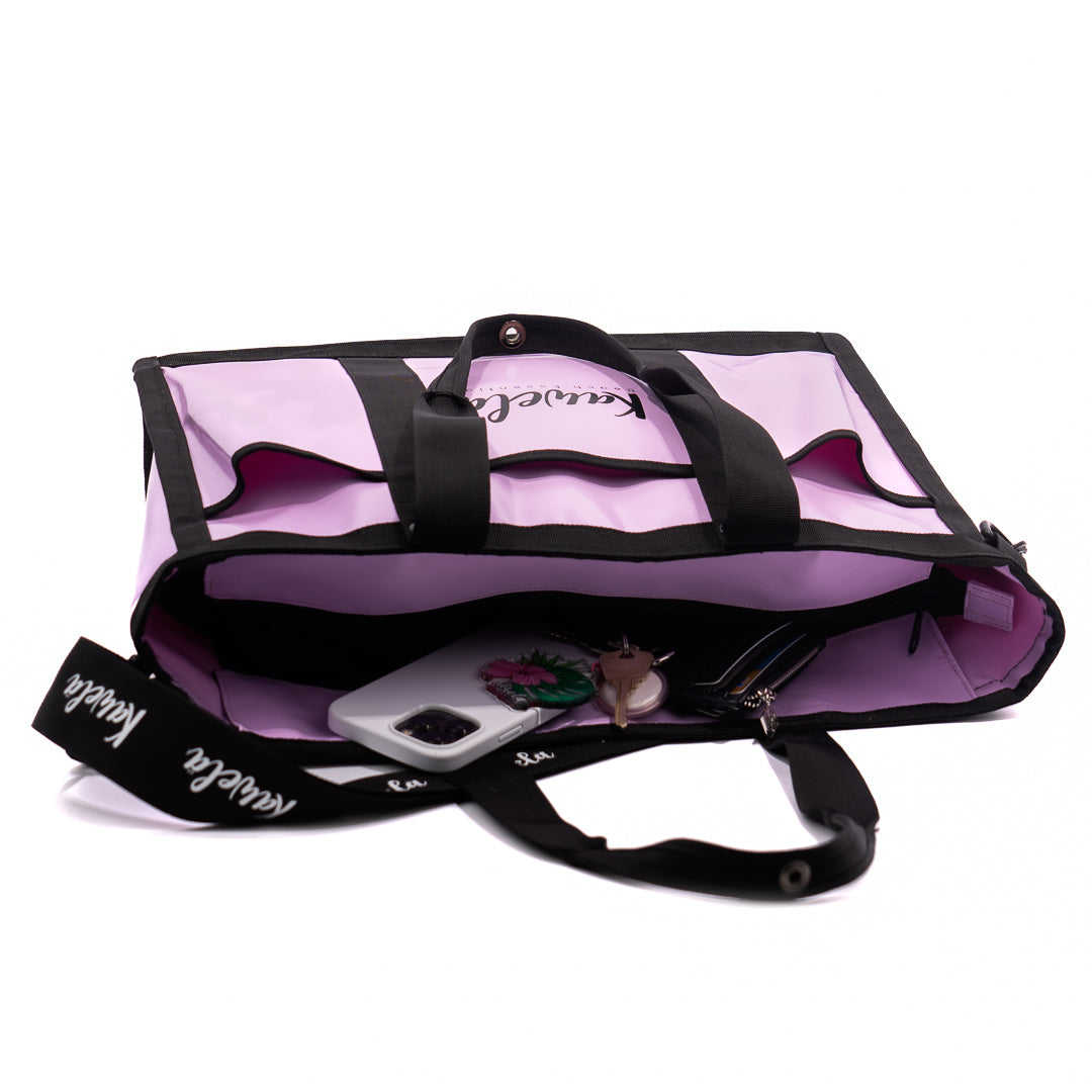 Sac fourre-tout KAWELÄ SHINAN 25L en tissu durable, vue de face avec poignées et fermeture sécurisée.