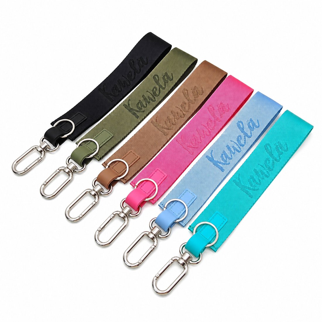 Clé en forme de méga porte-clé avec un chapeau bucket de la marque Kawelä, en plastique coloré.