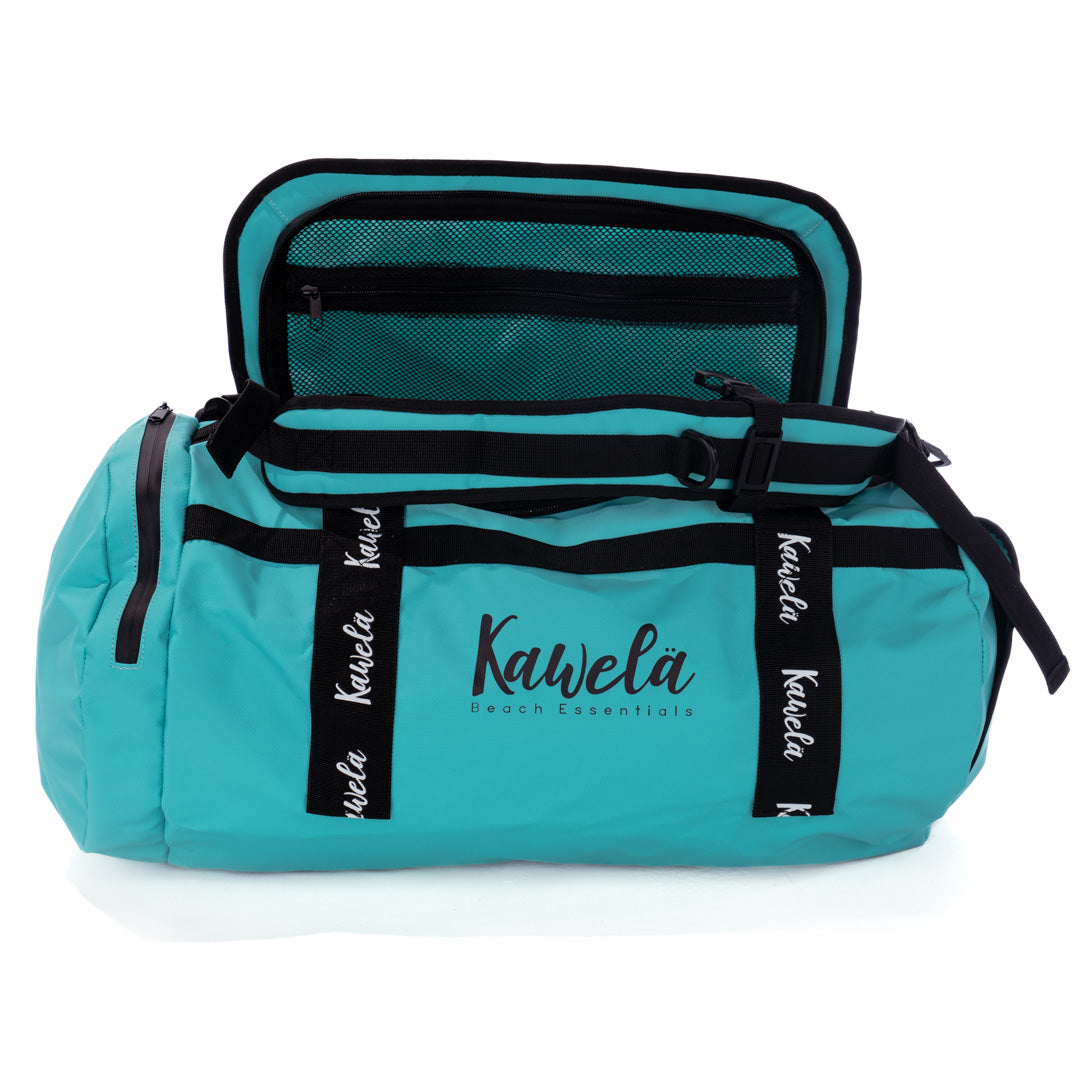 Sac de voyage KAWELÄ ODAIBA en bleu et vert, sac pratique avec poches et poignée pour les déplacements.