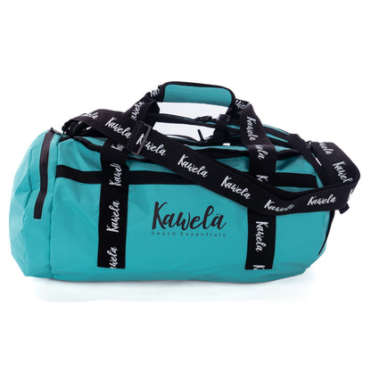 Sac de voyage KAWELÄ ODAIBA bleu vert avec poignées et compartiments, prêt pour l&