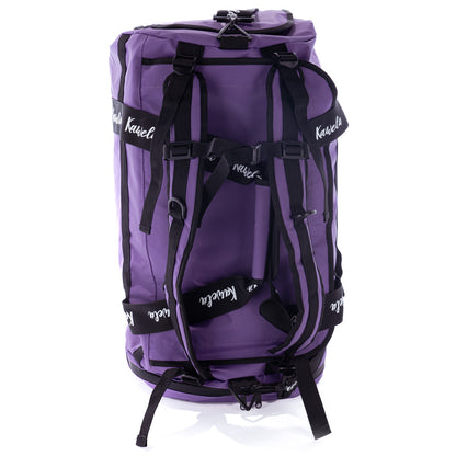 Sac de voyage mauve Coachella de la marque Kawelä avec poignée et compartiments visibles.
