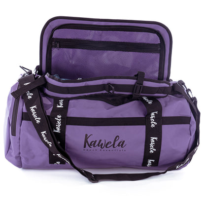 Sac de voyage mauve Coachella de la marque Kawelä, léger et spacieux, avec poignées et fermeture zippée visible.