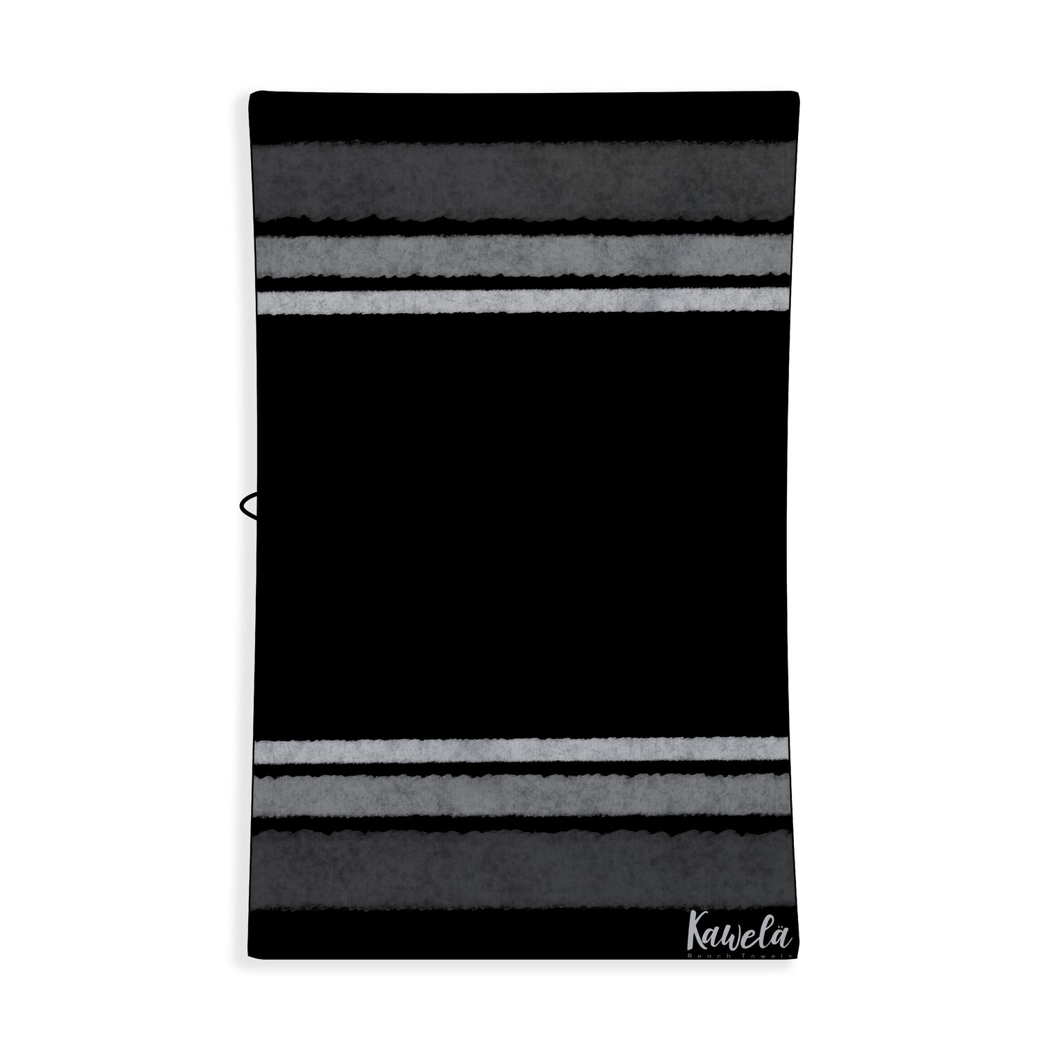 Serviette de plage SAN PEDROS de la marque KAWELÄ, dessin coloré avec motifs marins, étendue sur la plage.